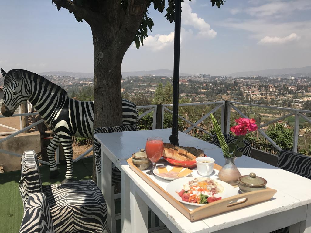 Pili Pili Boutique Hotel Кигали Экстерьер фото