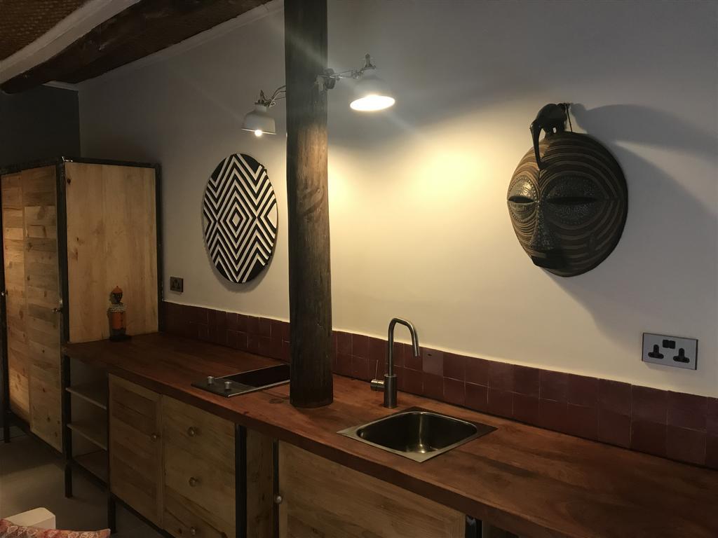 Pili Pili Boutique Hotel Кигали Номер фото