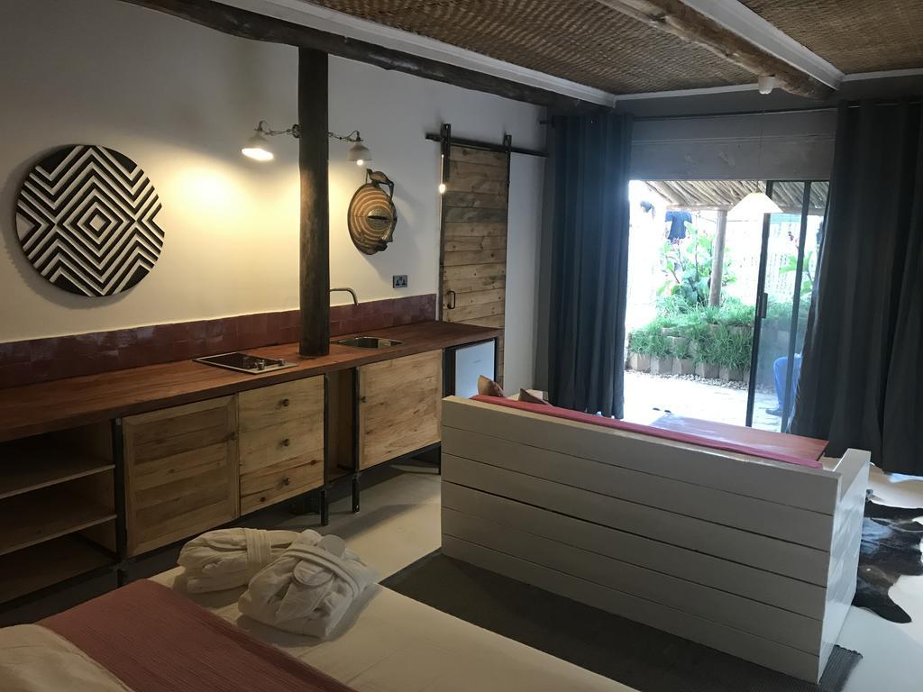 Pili Pili Boutique Hotel Кигали Номер фото