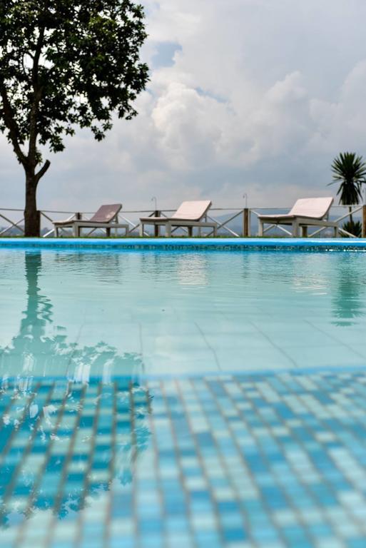 Pili Pili Boutique Hotel Кигали Экстерьер фото