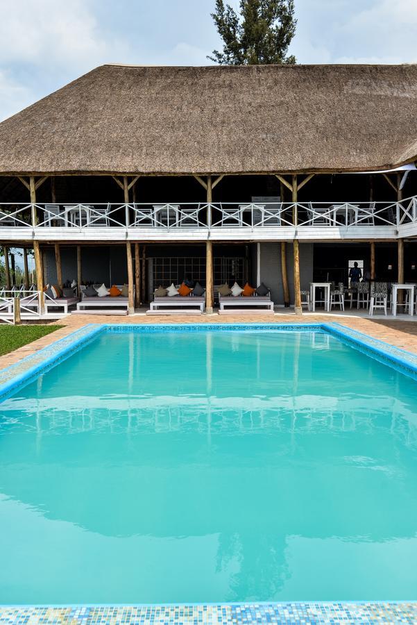 Pili Pili Boutique Hotel Кигали Экстерьер фото